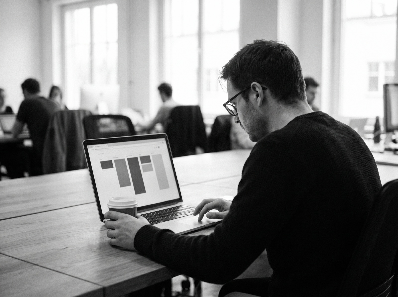 A specialist configuring a CRM pipeline on a laptop